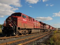 CP 424 passing the east end of the Woodstock Yard behind CP 8624 - CP 9645 - CP 6004 - CP 6608 - CP 6001 - CP 9765 - SOO 6040