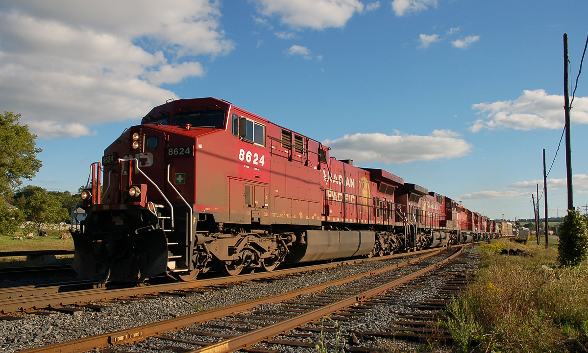 CP 424 passing the east end of the Woodstock Yard behind CP 8624 - CP 9645 - CP 6004 - CP 6608 - CP 6001 - CP 9765 - SOO 6040