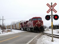 CP 8637 - CP 9780 passing thru the small town of Drumbo, ON after completing their work at Wolverton