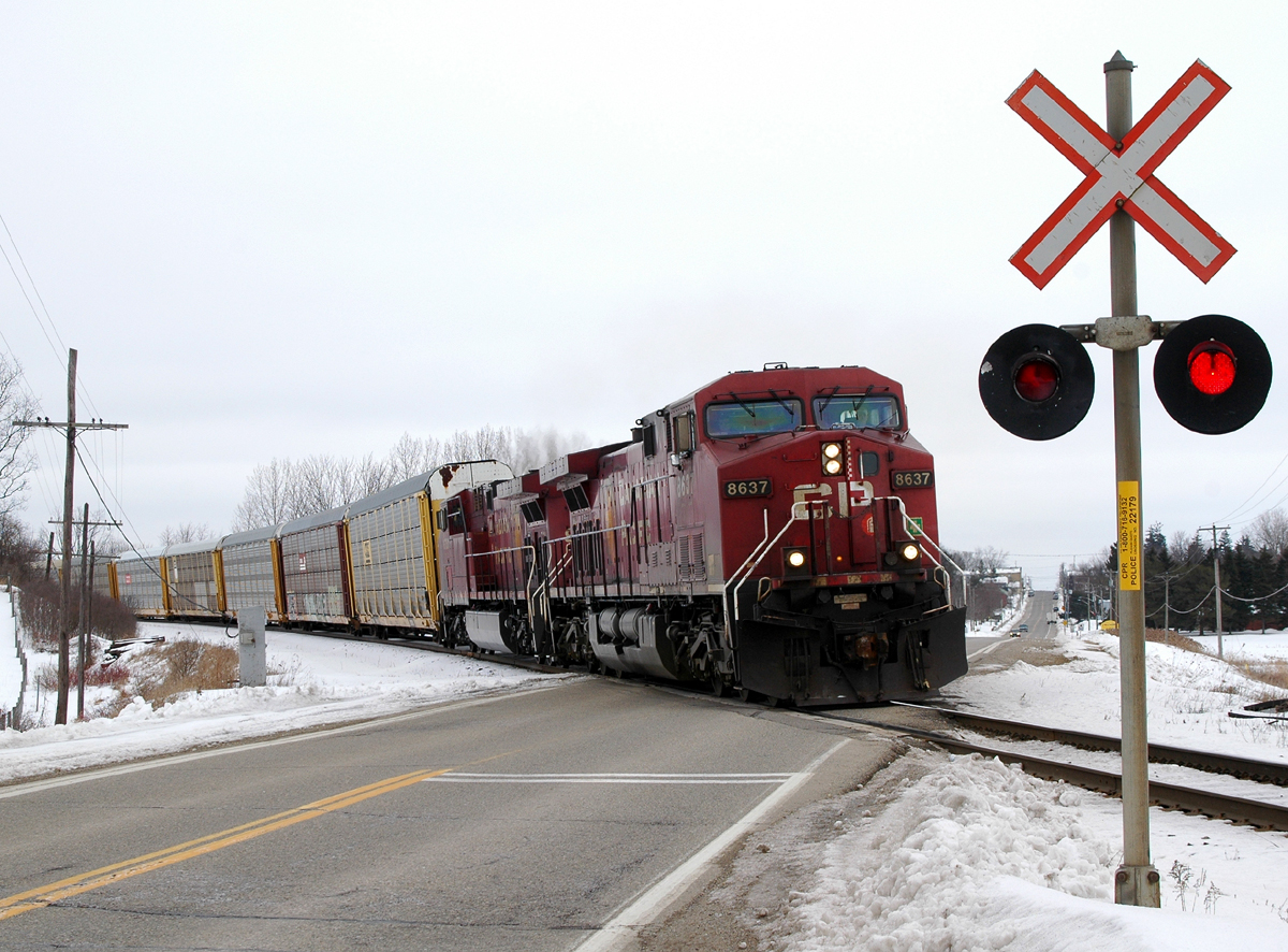 CP 8637 - CP 9780 passing thru the small town of Drumbo, ON after completing their work at Wolverton