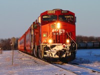 Potash empties head for Portage at sunset.