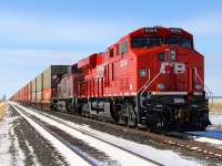 Eastbound CP 110 waits at Marquette for the line to clear.