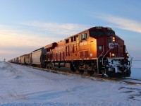 An eastbound manifest heads for Winnipeg at last light.
