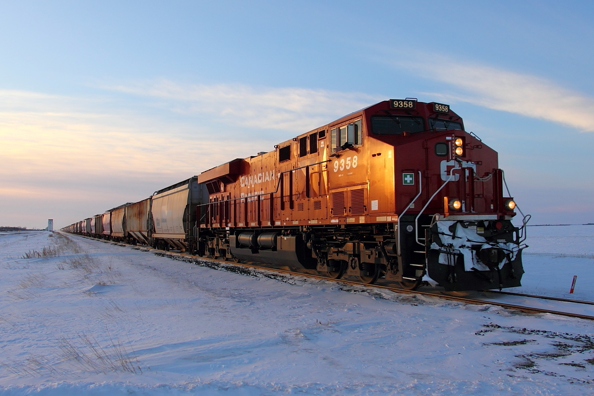 An eastbound manifest heads for Winnipeg at last light.
