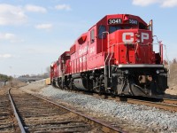 The Wolverton Turn with CP 3041, 3032 and 3038 waits for permission from the RTC to enter onto the CP Galt Sub and head west to CTC Wolverton. Note the new Hespeler Road bridge in the background; finally constructed after all the grief from vehicular and pedestrian traffic at the Delta intersection.