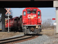 The Wolverton Turn with newly-repainted CP 3041 on the point finally pulls loaded autoracks off the Waterloo Sub and onto the Galt Sub. The train had to wait for CP 8811 East (CP 254?) to come through on the main. There were problems with the 8811 East which held up the Wolverton turn - the train was longer than it was supposed to be; extra cars had to be set-off near Killean.