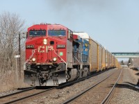 CP 9643 West accelerates after having some sort of problem with their train. The crossing gates at Appleby Line were down for a long time as a number of motorists were waiting. Despite the hold up, no one seemed frustrated or upset; in fact, people got out of their cars and snapped a few pics! It was a nice sunny spring Saturday of the Easter weekend!