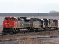 The sun was still low in the sky when 314 with the SD70M-2 class unit leading rolled by on the home stretch of its trip into Mac Yard, shortly after having met 301 between Doncaster and Snider. Trailing are the GTW 5955 and IC 1033. Had 314 made it by any earlier, this shot would have been blocked by 301's tail end which is just outside of the frame.