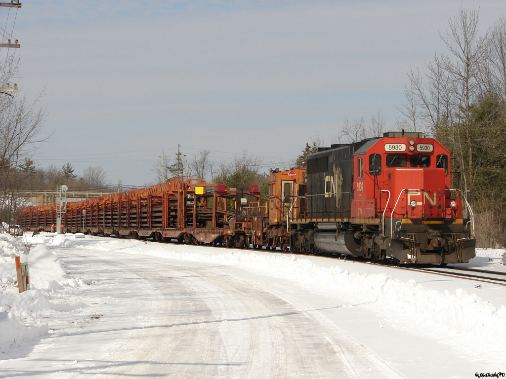 CN W90831 26 - GTW 5930 pull their train out of the Bala sub siding, to clear signal 891 at Washago before getting a pass stop authority to shove their train up the Newmarket sub into the clear before waiting for a few more trains then finally, getting down to business.