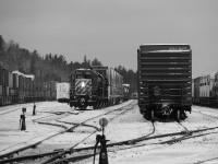 CP 5922 South staged in Cartier with her train in 2 pieces, the head end with a block swap they lifted here and some Sudbury traffic tied down in track 5, with the balance in track 7. 