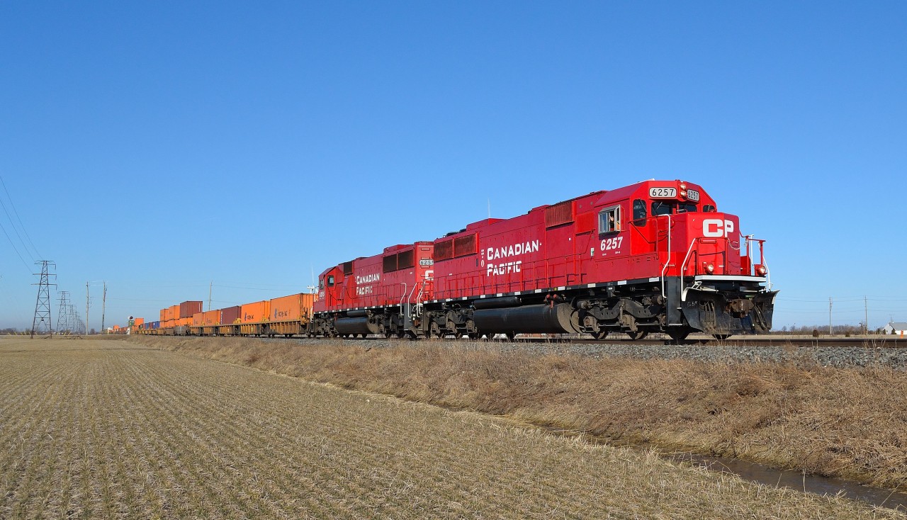 Sporting their new colours, former SOO's 6057 & 6055 (now CP 6257 & 6255)lead CP 282 eastbound thru Haycroft mile on a beautiful sunny morning.