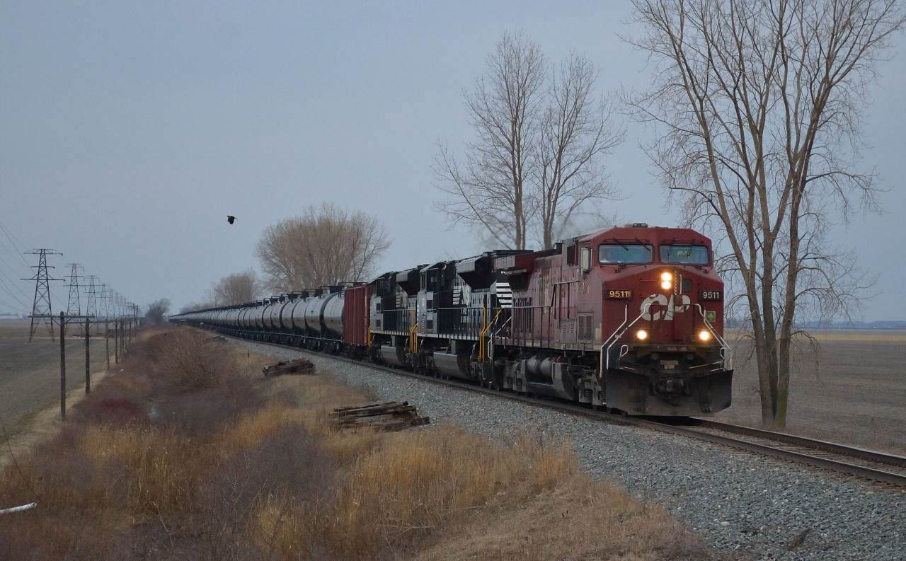 CP 608 heads eastbound thru Jeannette mile with 100 loads of crude led by CP 9511 and NS 1012 & 1022