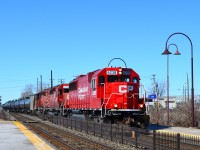 CP has been running an increasing number of unit oil trains recently. This morning I just missed an eastbound oil train led by two CP GE's and with a 9300 class GEVO as the rear end DPU, but in under an hour another eastbound oil train passed through Dorval with a sweet, all-EMD consist of CP 6238, CP 5958 & CP 58??.