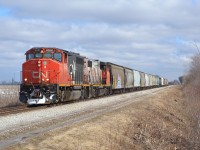 CN 439 led by a GP 40-2LW heads westbound towards Windsor after just crossing over the Ringold Diamond.