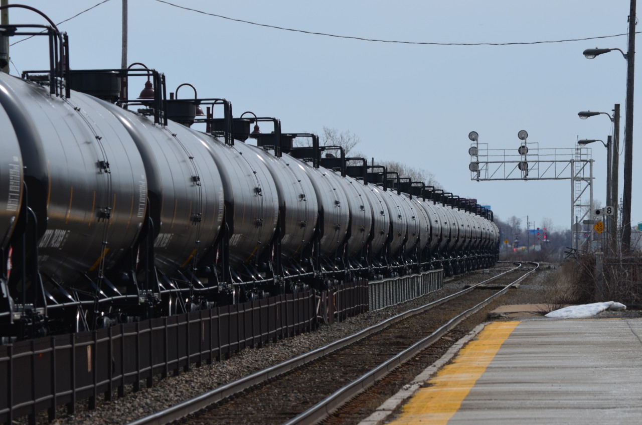 Black gold - an unending stream of loaded tank cars heads east through Dorval. Head end power was CP 8898 & CEFX 1028, with CP 9740 at the rear end.