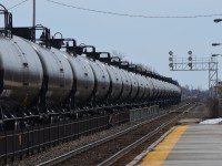 Black gold - an unending stream of loaded tank cars heads east through Dorval. Head end power was CP 8898 & CEFX 1028, with CP 9740 at the rear end.