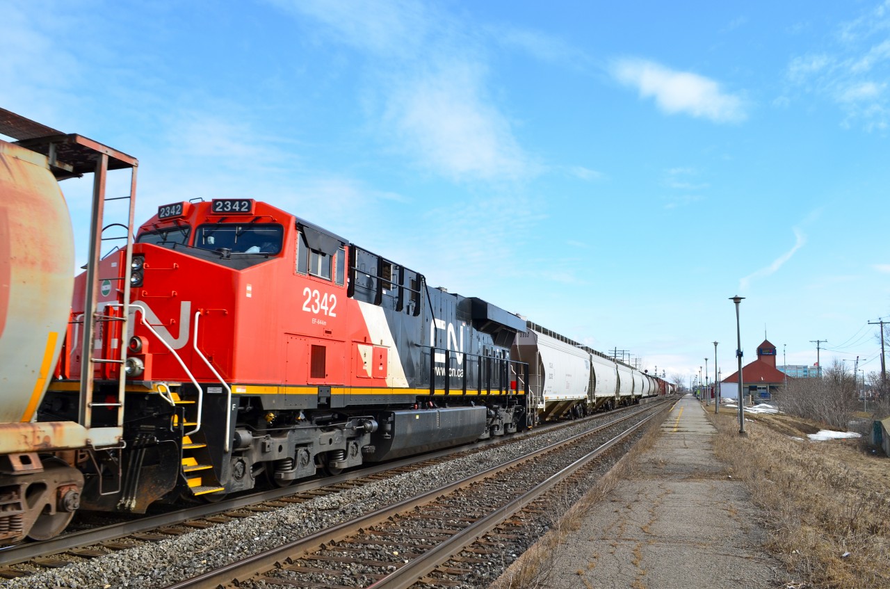 CN 2342 is the DPU on a CN eastbound at Dorval. At the head end were two more GE's: CN 2233 & Cn 2408.