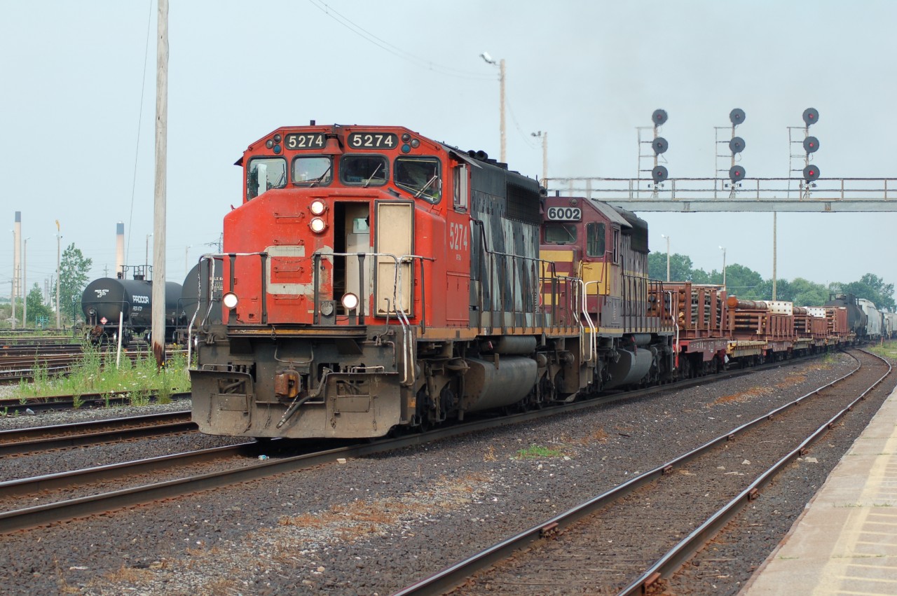 Eastbound at Sarnia are CN 5274 and WC 6002, was still possible then to catch interesting consists on CN before the new SD70 and ES44 types killed most of these off.