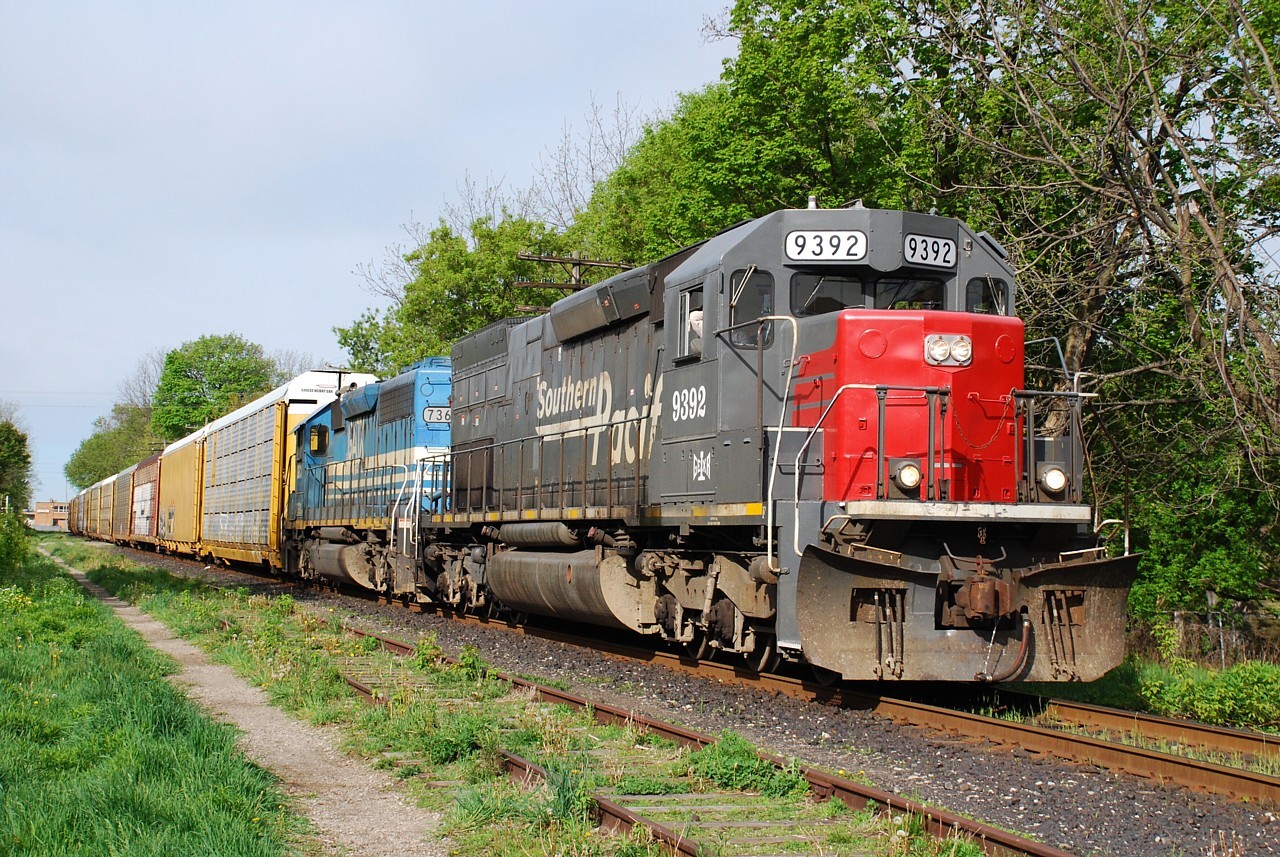 GEXR 432 crawls through Guelph adhering to the 10 mph slow order through town.