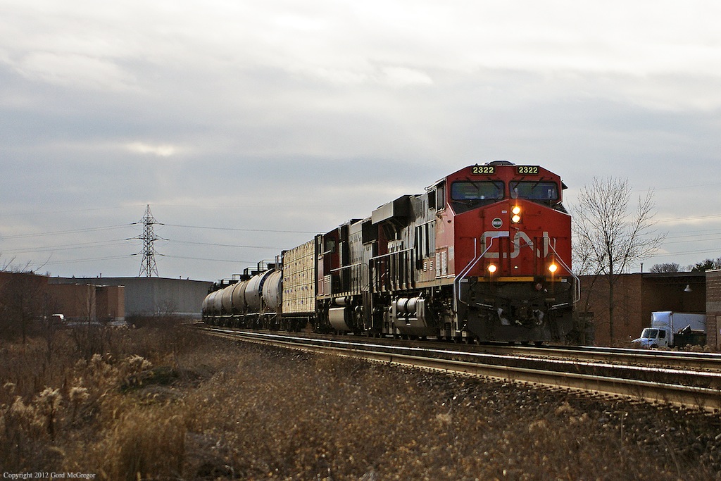 CN376 picks up a break in the clouds on its way from Doncaster on the York Sub.
