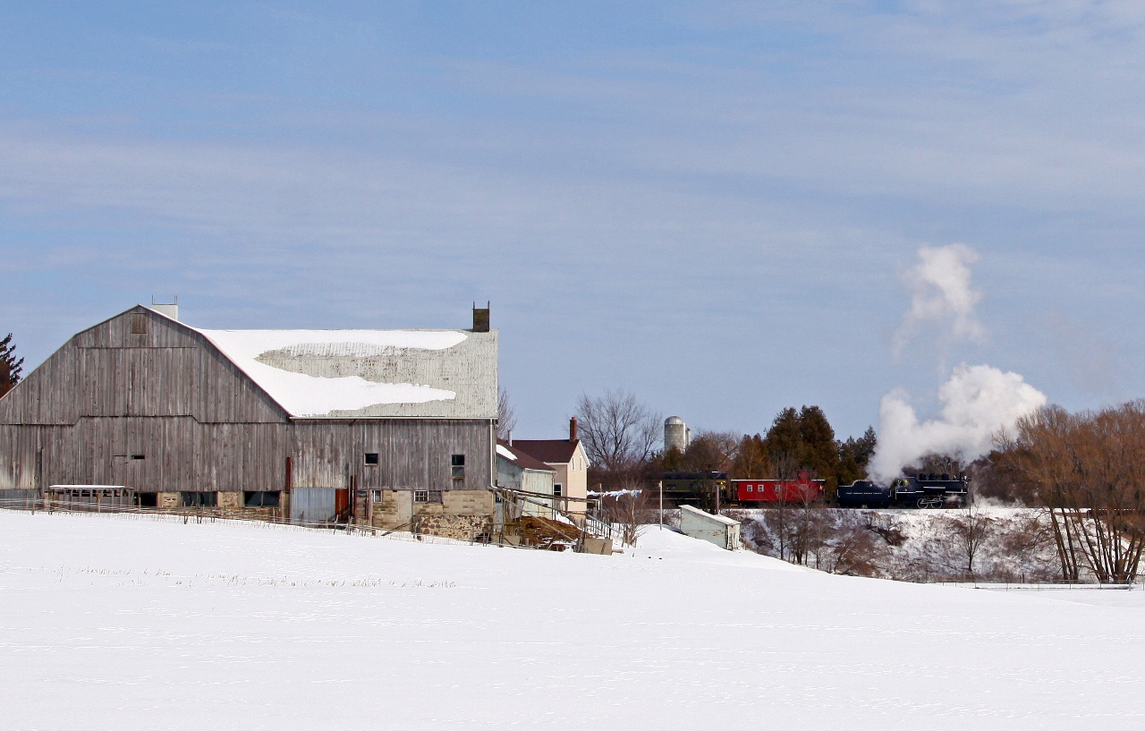 SOLRS' Essex Terminal #9 is along for the ride on the northbound leg of the Waterloo Central's Family Day excursion as they pass a bucolic scene south of the village of St. Jacobs.