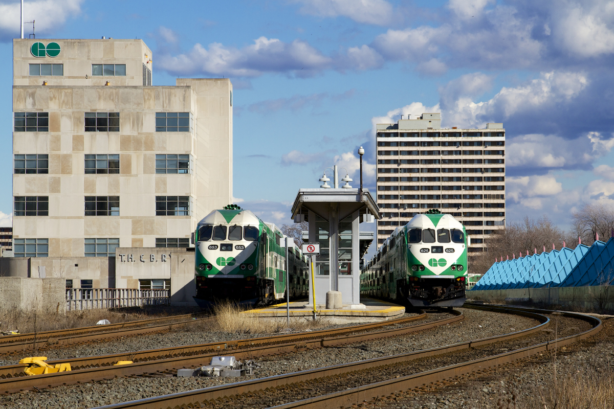 The Hamilton GO trains are tied down at TH&B's Hunter Street station on a gorgeous Good Friday afternoon. TH&B's Hunter Street station, now the Hamilton GO Centre was built by Fellheimer and Wagner in 1933 and is a rare example of Art Moderne architecture in Canada.