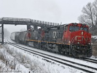 IC 2721 and 2707 lead train 376 through a late winter snowfall at Lovekin. 1652hrs.