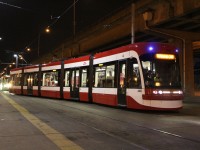 TTC's newest streetcar, 4400, snakes through the crossovers at Exhibition Loop during a test run. This would be only its second trip out onto public streets, with all previous testing taking place at Hillcrest Complex.