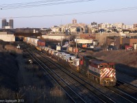 BCOL 4605 chugs west with Q149's train on the knuckle.