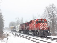 CP #240 kicks up fresh snow on the first day of spring. These days it getting rare catching SD40s in the lead.
