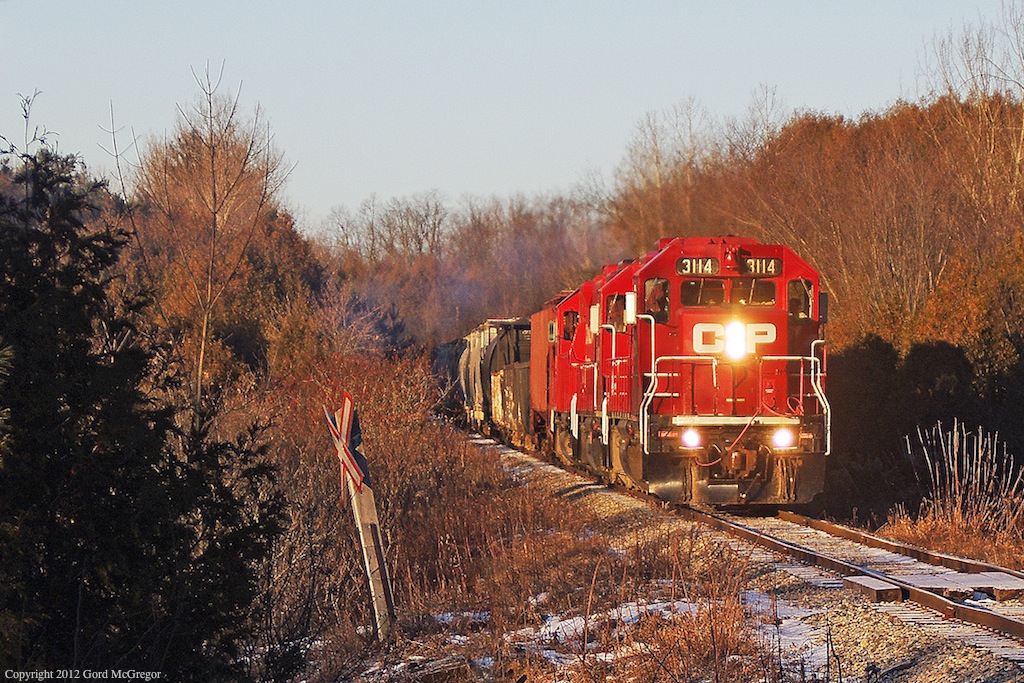 An abandoned road crossing deep in the backwoods near Claremont Ontario.