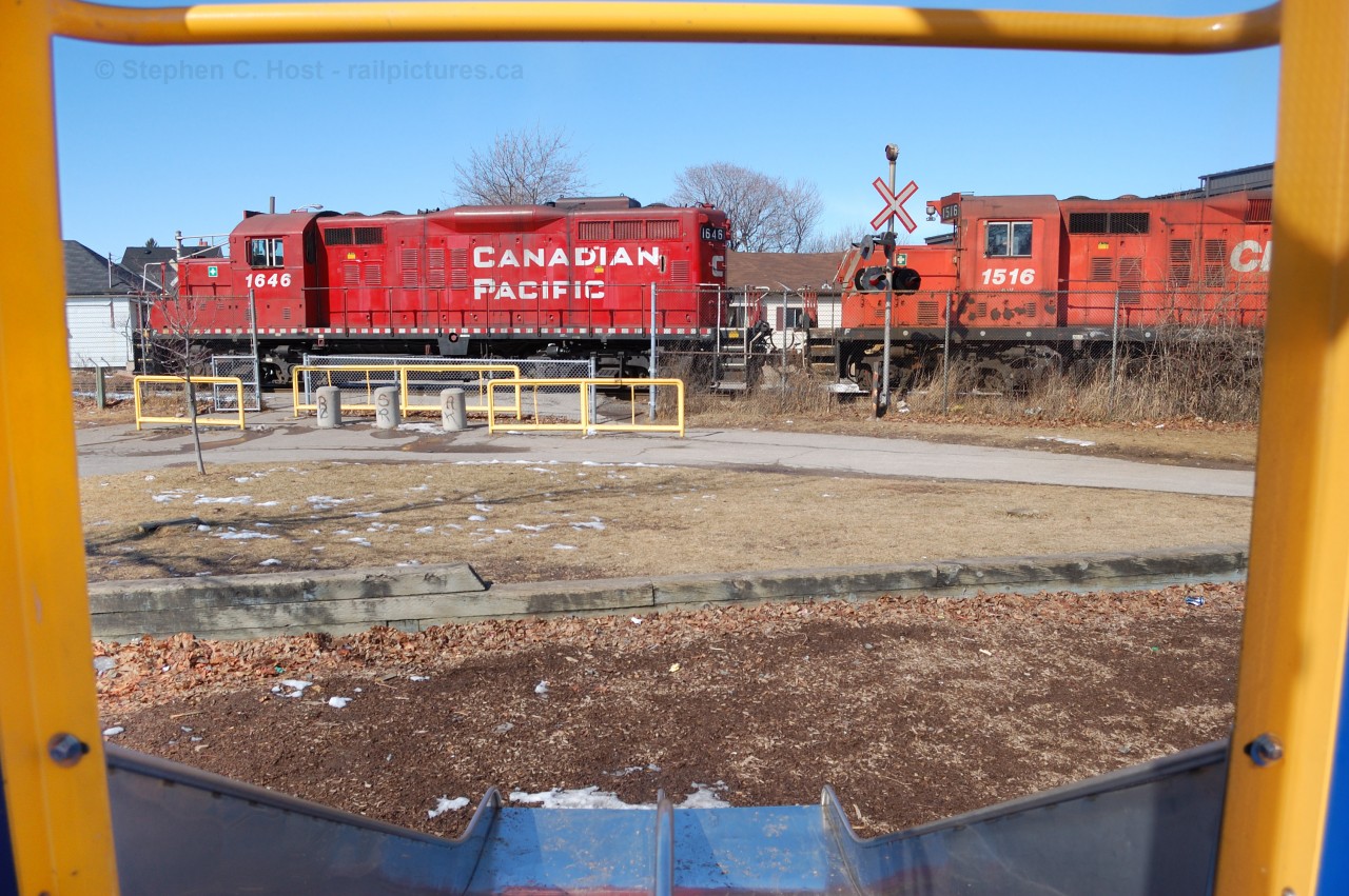 We're at Belview Park in Hamilton - my daughter - two years old at the time - and I are playing in the playground as we had spent some time photographing CP near US Steel earlier in the morning. I figured this would be a  nice spot for us to let off some steam before the train showed up. Imagine our suprise as our play is interrupted by the sound of three roaring 567's struggling to maintain track speed as they lift heavy tonnage up the grade from the CNR underpass. In total three GP9's - 1646, 1516, and 1542 with 4000 tons, 2500' of Steel Ingots - after the show ended we resumed our play and enjoyed the rest of the early spring-like weather.