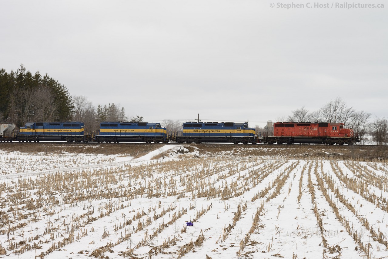 CP 640 with CP 5833, ICE 6441, ICE 6101, ICE 6442 is emerging out of the Puslinch Siding after meeting 147 who held the main.