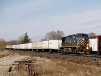 Due to delays over in Michigan this train was designated as an X144 due to it's late departure. Having a BC Rail unit leading is a rare treat on this train. BCOL 4651 has 66 Triple Crown trailers in check as they come down the grade into Brantford.