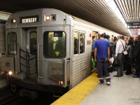 <b>Like Sardines in Tin Cans.</b>
<br><br>
With its 1960's tiling, low ceilings, narrow platforms and crowded nature, the TTC's Yonge Subway Station during rush hour is enough to make anyone feel claustrophobic. At 5:07pm on a Wednesday, the usual large crowds wait to board as passengers disembark an eastbound train bound for Kennedy with TTC H6 5899 in the lead. Inside the train, it's standing room only for the rest of the trip.
<br><br>
And it wasn't any better for your photographer, who was heading westbound and then south to Toronto's Union Station, where he traded standing armpit to armpit with strangers for one of the last seats on a packed GO Train home.