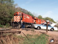 Classic CP MLW power in the form of C-424's and RS-18's lead todays 520 as it changes crews at the brickyard along Lawrence Road in Hamilton.