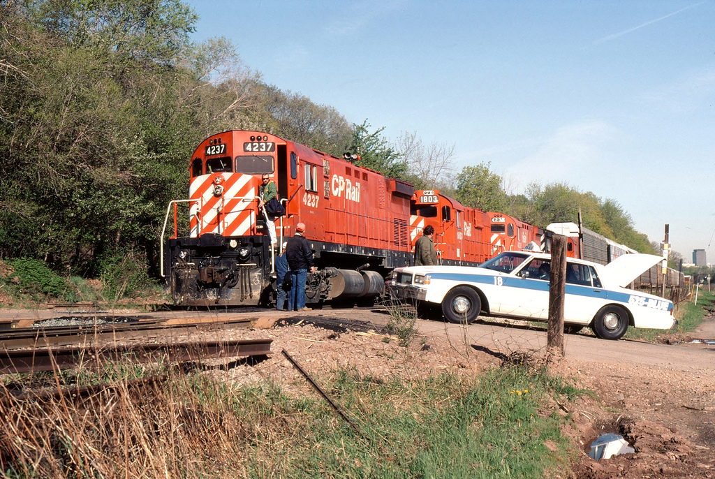 Classic CP MLW power in the form of C-424's and RS-18's lead todays 520 as it changes crews at the brickyard along Lawrence Road in Hamilton.