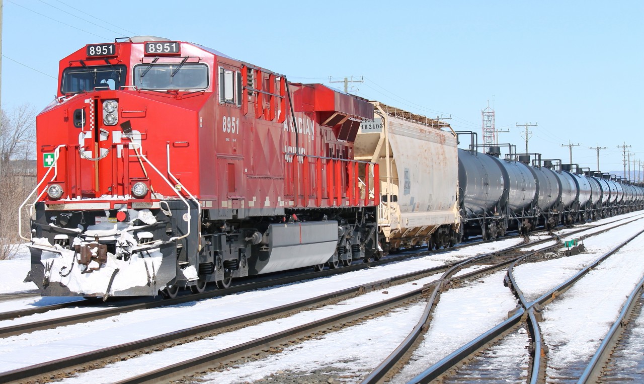 Thunder Bay is an inspection point for eastbound loaded petroleum crude oil [un#1267] trains. While the cars are being inspected in the Westfort yard, the head end power [for this train it is cp8613, cp9810] usually goes to the shops for fuel and maintenance. Prior to heading east with 120 cars, the Schreiber crew will add a remote unit to the tail end. In this instance the unit is almost new ES44AC cp 8951.