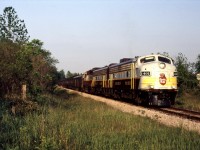 Heading into the setting sun RCP train lead by CP F-unit 1401 heads through Arkell ON on it's way to Guelph for the evening. 