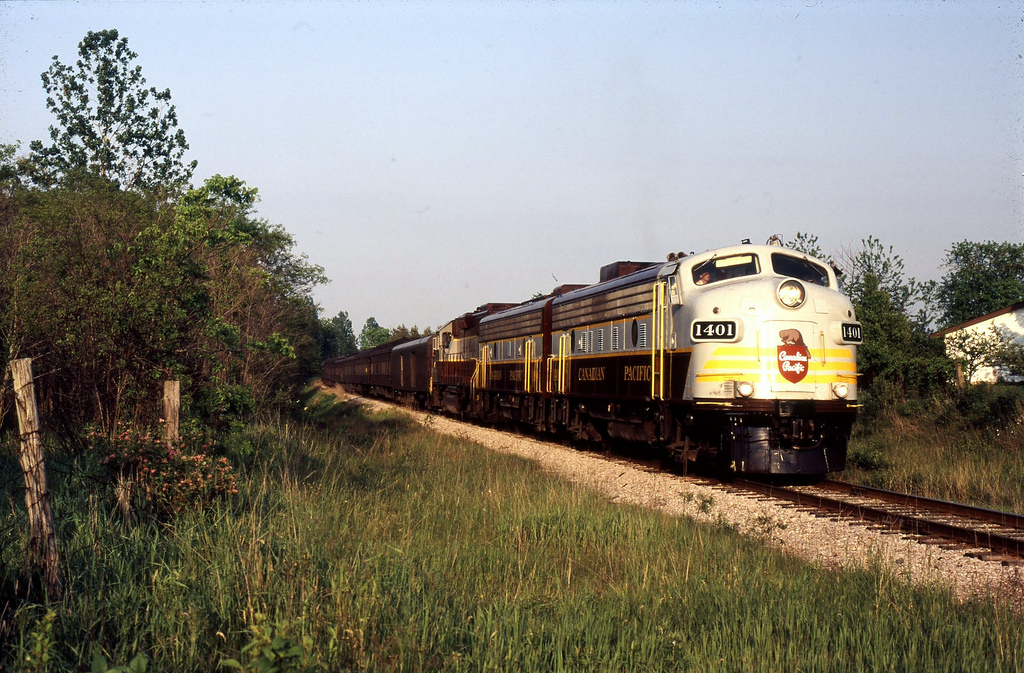 Heading into the setting sun RCP train lead by CP F-unit 1401 heads through Arkell ON on it's way to Guelph for the evening.