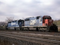 CN 382 pulls in to Aldershot Yard with DWP 5906 and CR 6654. DWP and GTW units rarely led in Southern Ontario, but once in a while one would sneak through.