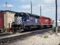 IMRL 355 and CP 5639 rest in London Yard. This was during the brief period that CP and IMRL were jointly running one train each way between Kansas City and Toronto. 