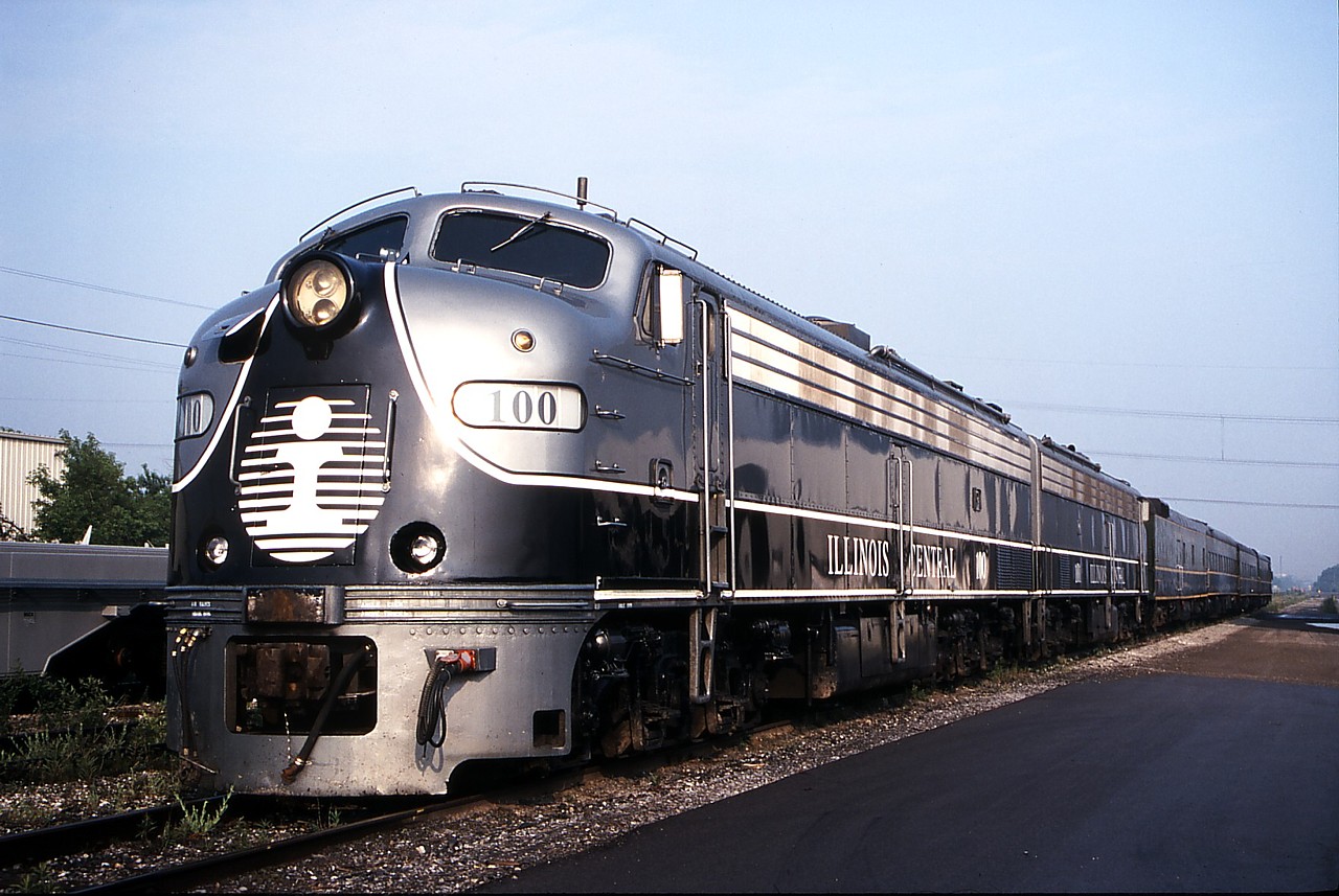 IC 100 & 101 and a 4 car business train arrived in Hamilton to lead a special train for Stelco from Hamilton to Nanticoke. Unfortunately, some bright spark decided that the Hagersville Sub. couldn't handle six-axle locomotives, and the business train ended up being hauled behind the steel train (CN 7080, CN 7012, six steel coil flats and then the four passenger cars). Classy.