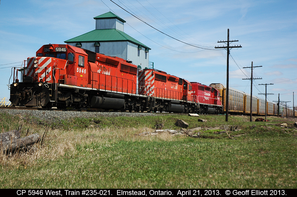 A sweet 'classic' CP lashup of 3 SD40-2's rolls past the old mill in Elmstead, Ontario today April 21, 2013. Train 235-021 has 5946, 6036, and 5690 powering it's way down the west end of the Windsor Sub.