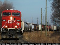 CP 8831 leads train 254-022 out of Windsor Yard and around the curve as it approaches Dougal Ave and 'Lakeshore' junction.