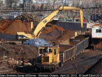 Zalev Brother's Scrap is in the middle of the city of Windsor, and here there 45 Tonner moves gons into place while a 'Cat' with a magnet drops metal into them.