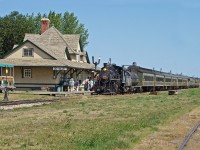 1920 Baldwin 2-8-0 #41 brings an Alberta Prairie Railway excursion into the Big Valley Station.