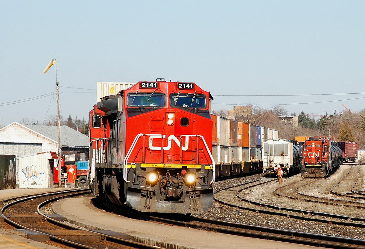 148 passing Brantford with CN 2141 - CN 2688 and 138 cars
