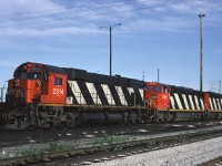 M-636 2314 sits with a pair of GEs at the north end of MacMillan Yard's diesel shop.