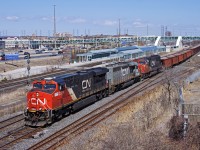 CN O493 hits the crossovers at Liverpool as it makes a run at the hill. The ballast would go back east on a W900 two days later.